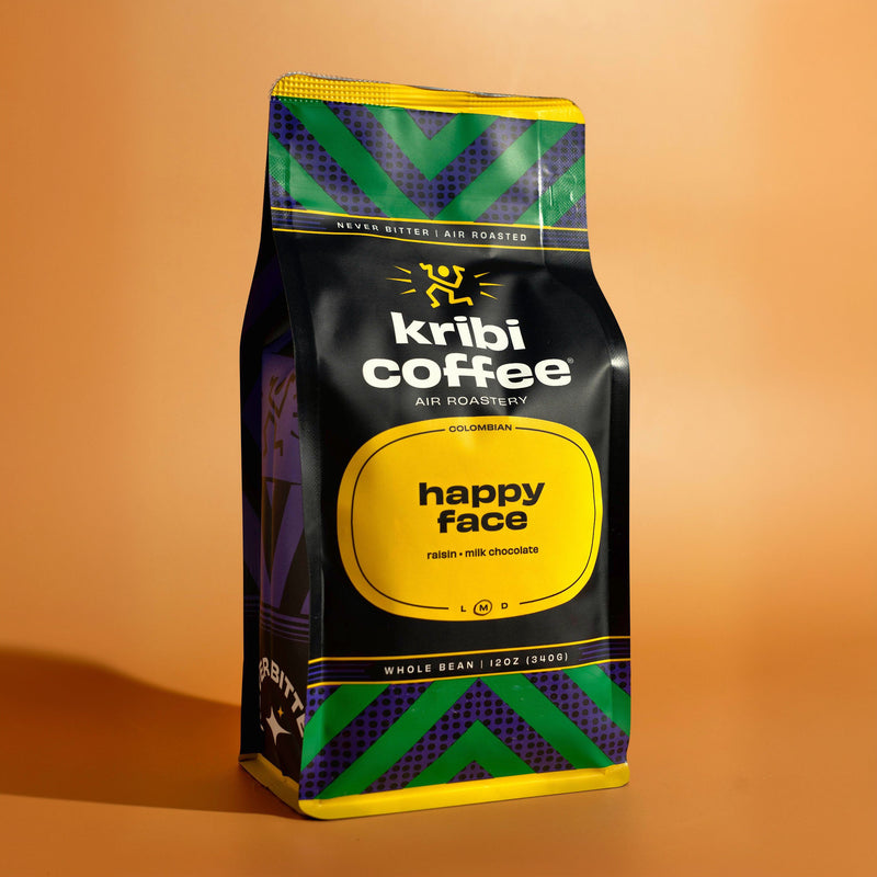 Bag of Kribi Coffee Happy Face whole bean coffee, air roasted
