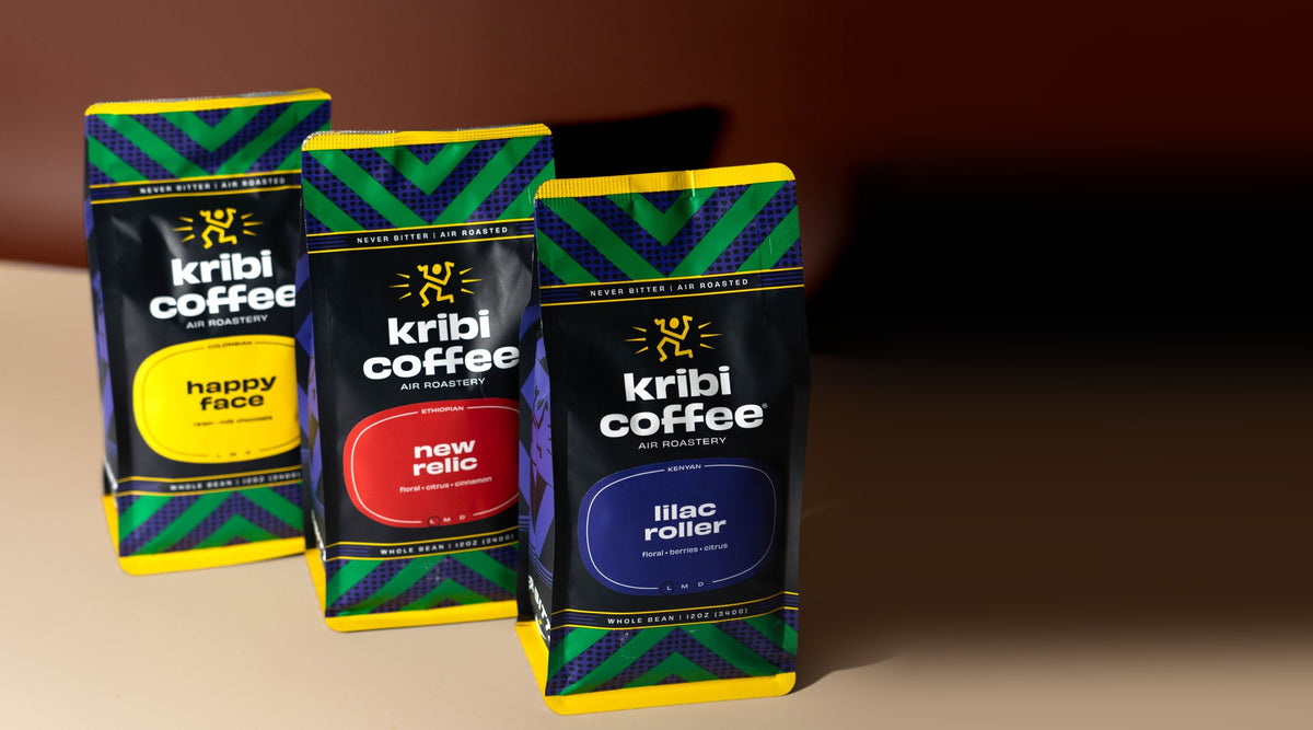 Three bags of Kribi Coffee: Happy Face, New Relic and Lilac Roller