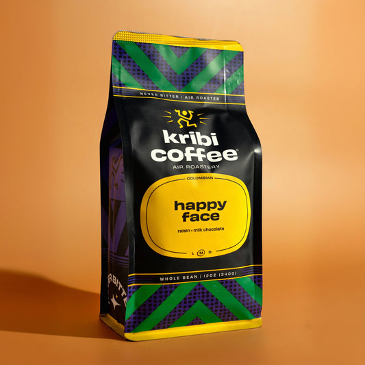 Bag of Kribi Coffee Happy Face whole bean coffee, air roasted